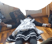 a maid laying on the floor with a speech bubble above her head