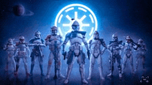 a group of star wars clone trooper action figures standing next to each other in front of a star wars logo .