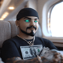 a man with a beard and green eyes holding a 100 dollar bill