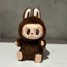 a stuffed animal that says popmart on the bottom of it