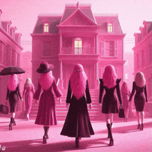 a group of women are walking in front of a pink house