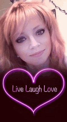 a woman with pink hair is surrounded by a purple heart that says live laugh love