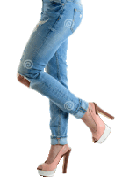 a woman wearing a pair of pink high heels and jeans