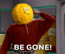 a man in a red shirt with a yellow smiley face on his head says " be gone "