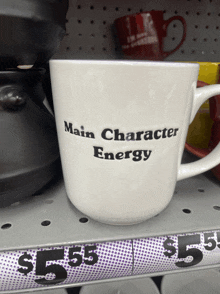 a mug that says main character energy is on a shelf