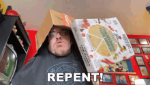 a man is holding a box of cauliflower potato crisps and the word repent is on the bottom