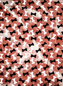 a pattern of black and white bones on a red surface