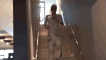 a blurry picture of a person walking up stairs