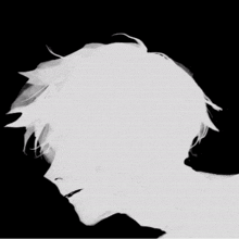 a silhouette of a person 's face with a black background