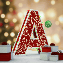 the letter a is decorated with christmas decorations and lights