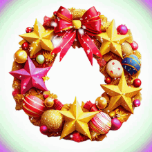 a christmas wreath with gold stars and red bows