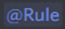 a blurred image of the word rule on a dark background .