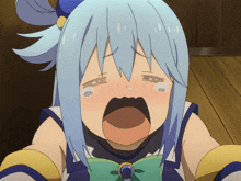 a girl with blue hair is crying with tears coming out of her eyes