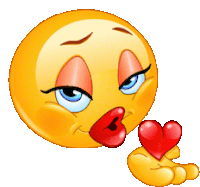 a female smiley face blowing a kiss while holding a heart