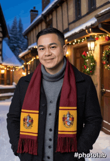 a man wearing a scarf with a gryffindor crest on it