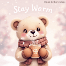 a teddy bear wearing a scarf and holding a cup of hot chocolate with the words stay warm below it