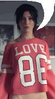 a woman is wearing a red shirt that says love on it