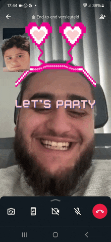 a man with a beard is smiling with the words let 's party above his head