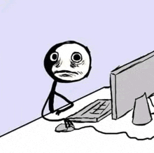 a stick figure is sitting at a desk looking at a computer monitor .