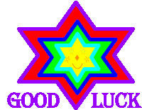 a colorful star with a face and the words good luck