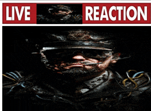 a man with a beard is smoking a cigarette under a live reaction sign