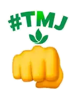 a fist with #tmj written on it