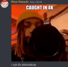 a picture of a person taking a picture with a caption that says caught in 4k