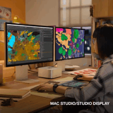 a woman sits at a desk with two computer monitors and the words mac studio / studio display above her