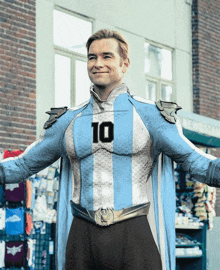 a man is wearing a superhero costume with the number 10 on his chest