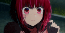 a girl with red hair and big red eyes is smiling