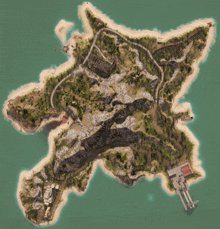 an aerial view of a small island with a few buildings on it