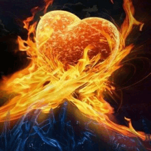 a heart is surrounded by flames and smoke on a dark background .