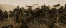 a group of soldiers riding horses with spears