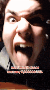 a close up of a man 's face with the words " reddit emojis dance accuracy 0.00000444 % " on the bottom