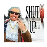 a man wearing headphones giving a peace sign in front of a sign that says " shut up "
