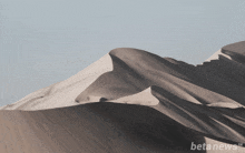 a picture of a sand dune with beta news written on the bottom