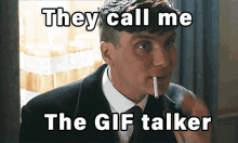 a man smoking a cigarette with the words they call me the gif talker