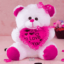 a teddy bear with a heart that says i love you