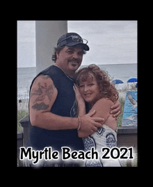 a man and woman posing for a picture at myrtle beach