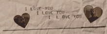 a piece of paper that says " i love you " on it