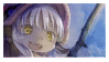 a stamp with a picture of a girl with white hair and yellow eyes holding a sword .