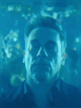 a man with his eyes closed in a blurry picture
