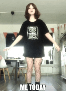 a girl wearing a jack daniels shirt and fishnet stockings