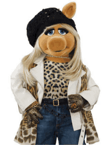 miss piggy from the muppet show is wearing a leopard print coat and gloves