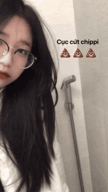 a girl wearing glasses is standing in a bathroom next to three poop emojis and the words cuc cut chippi