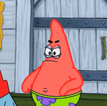 patrick star from spongebob squarepants has an angry look on his face .