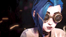 a woman with blue hair is wearing goggles and a choker .