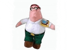 a stuffed peter griffin from family guy is wearing glasses and a watch .