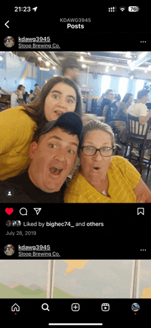 a group of people are posing for a picture in a restaurant with a post that says kdawg39:45 posts