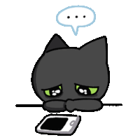 a black cat with green eyes is laying down next to a cell phone